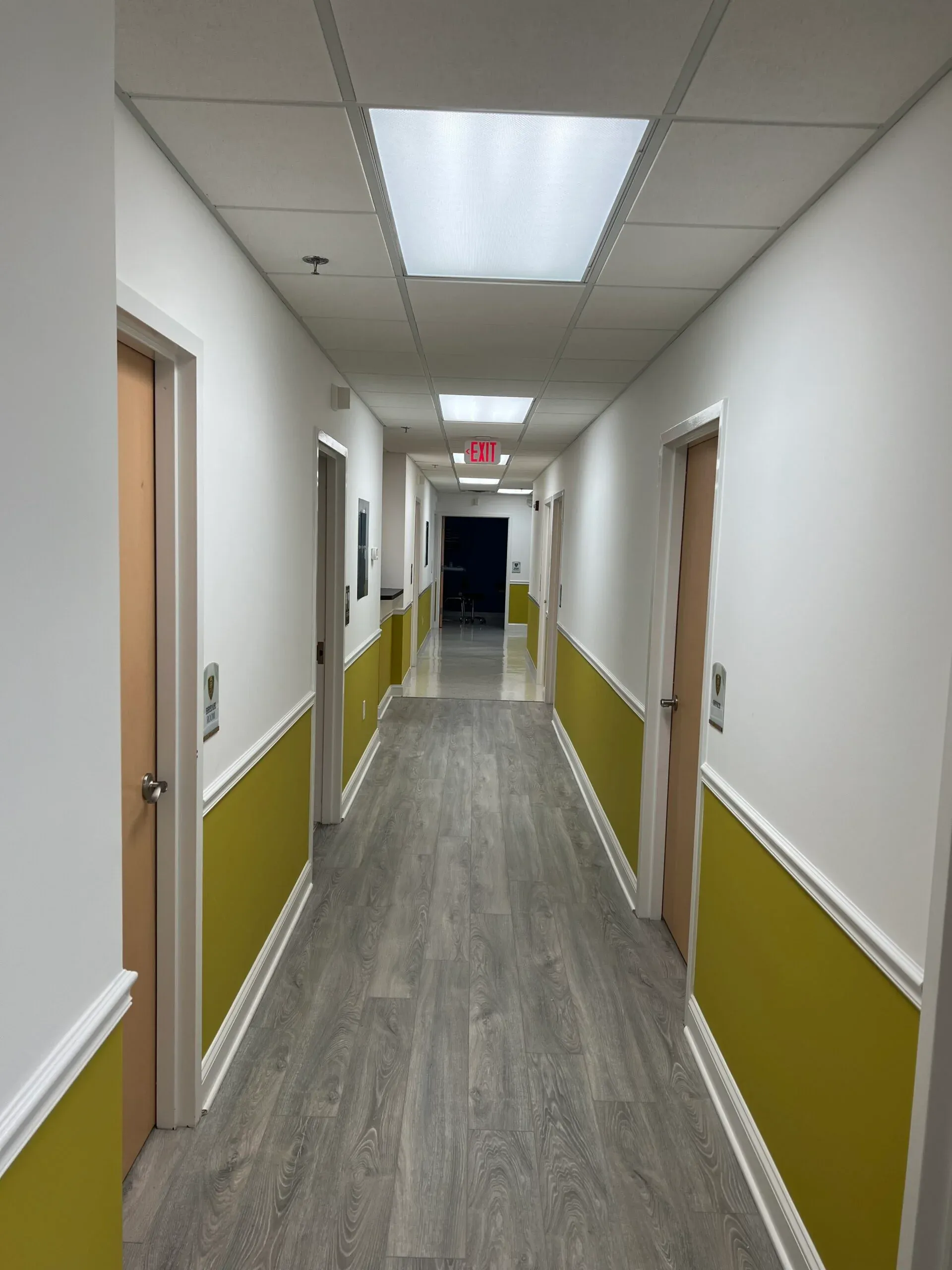 Clean, professional medical spa treatment room with neutral tones at Meta Dermatology in MOORESTOWN