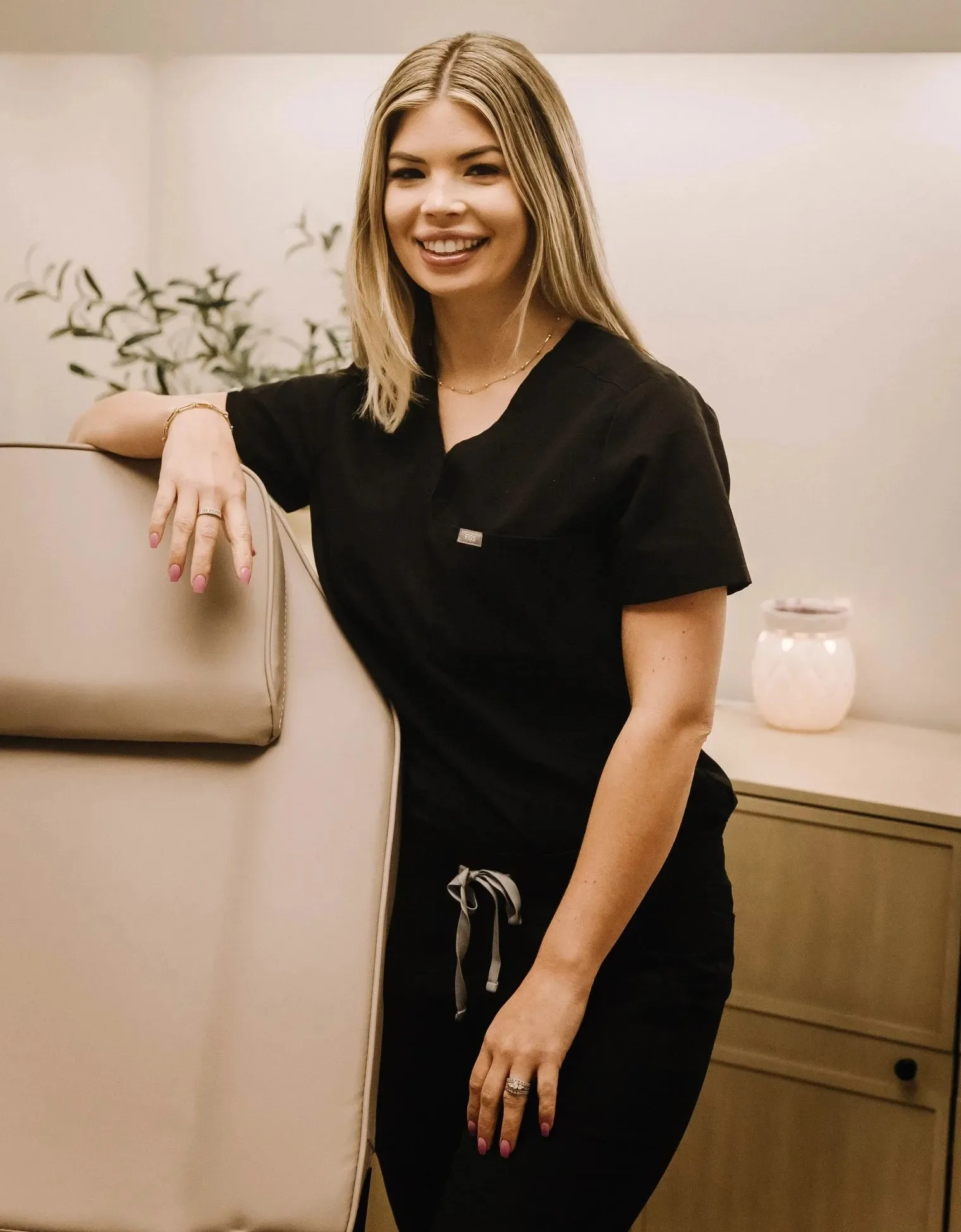 Clean, professional medical spa treatment room with neutral tones at Invigorate Aesthetics PLLC in Burlington