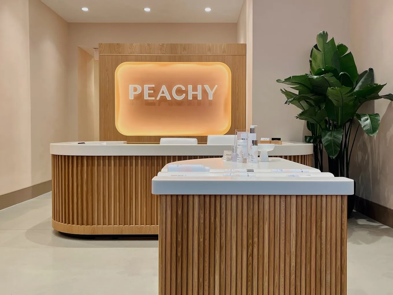 Clean, professional medical spa treatment room with neutral tones at Peachy - Nomad in New York 