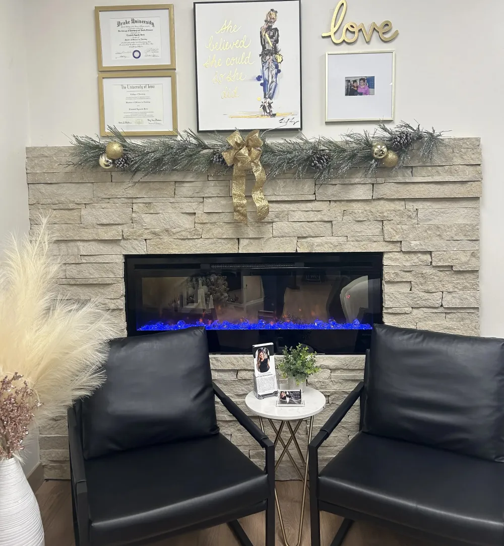 Clean, professional medical spa treatment room with neutral tones at Love Aesthetics in Lincoln