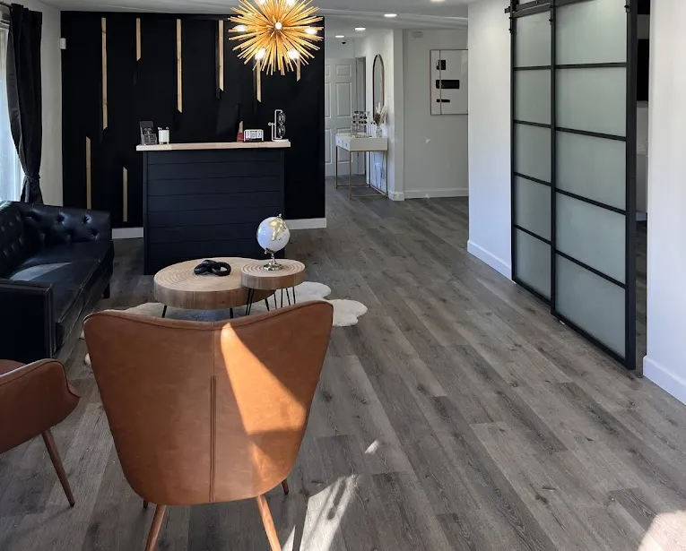 Clean, professional medical spa treatment room with neutral tones at Ageless Medspa LLC in Godfrey