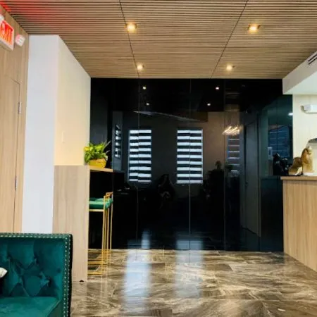 Clean, professional medical spa treatment room with neutral tones at Ocean Drive Aesthetics in Hollywood