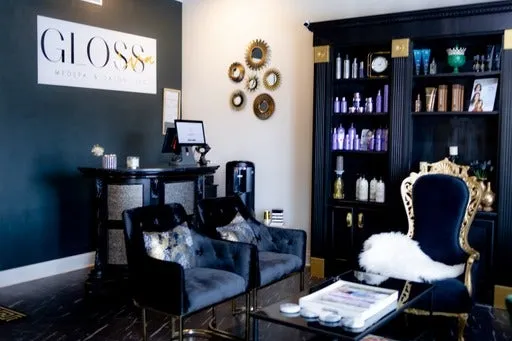Clean, professional medical spa treatment room with neutral tones at Gloss RVA Med Spa in MIDLOTHIAN