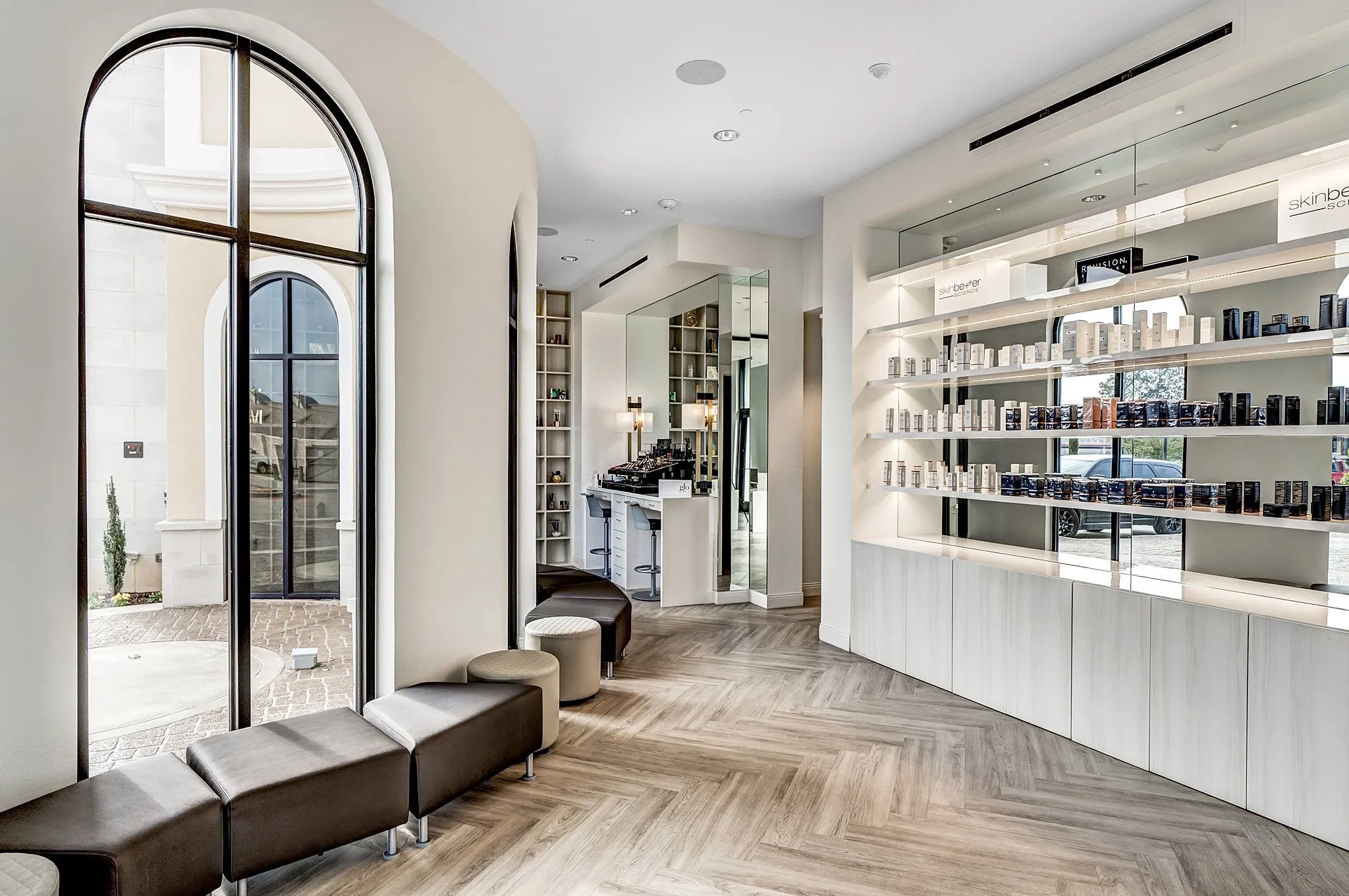 Clean, professional medical spa treatment room with neutral tones at CALM - Tyler in Tyler