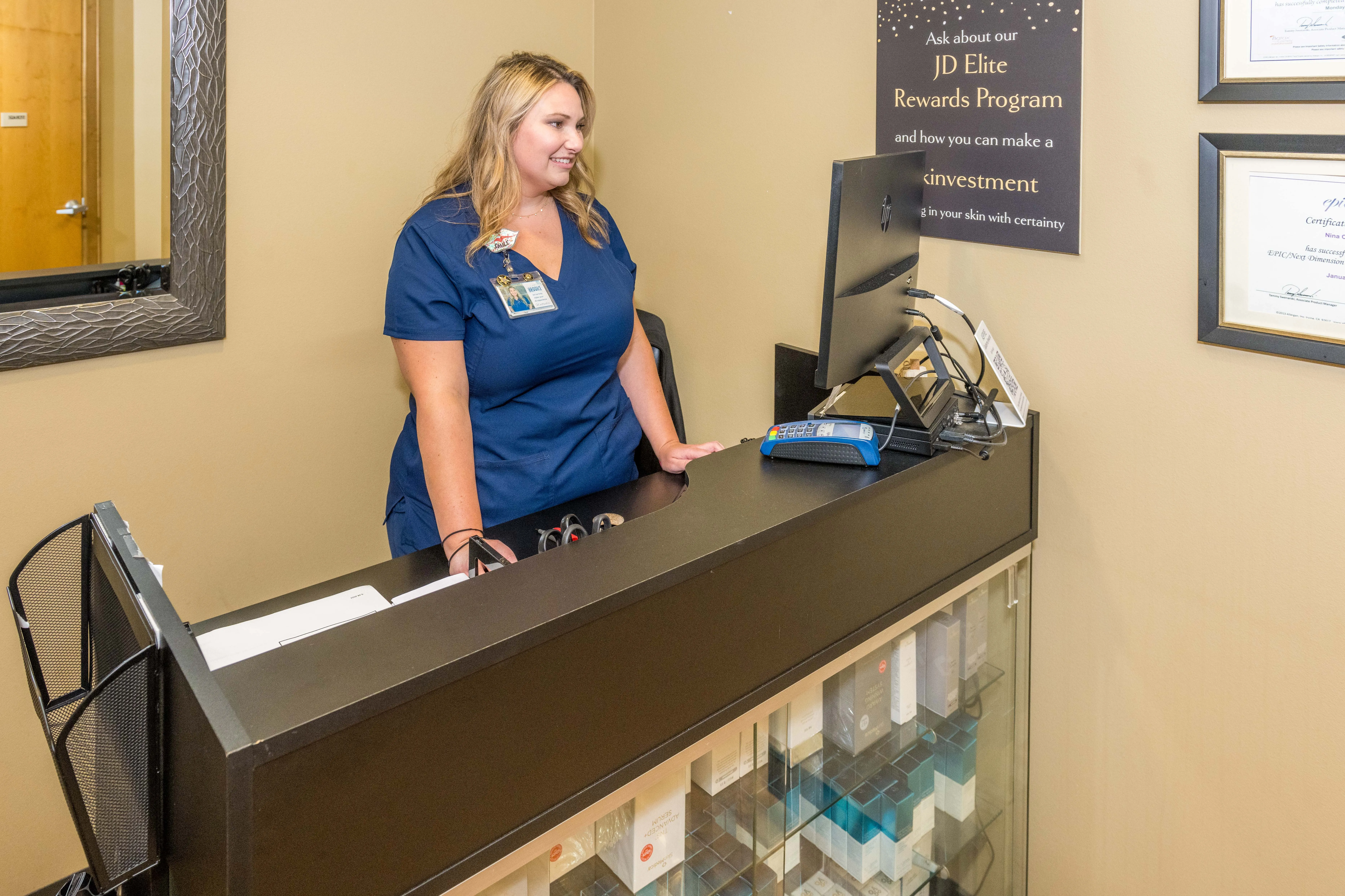 Clean, professional medical spa treatment room with neutral tones at Johnson Dermatology in Fort Smith
