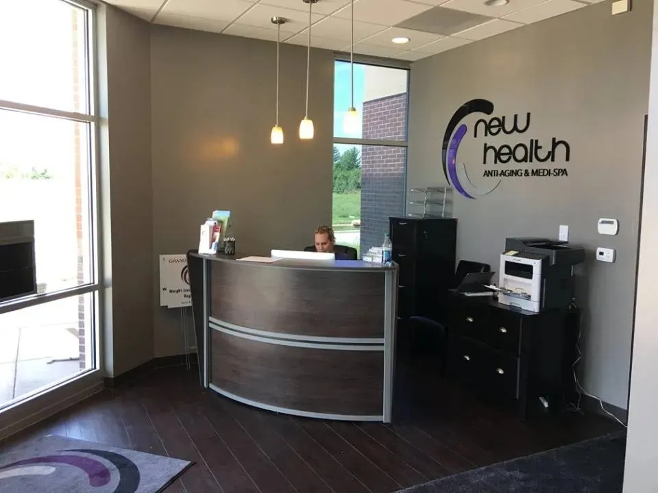 Clean, professional medical spa treatment room with neutral tones at New Health Lenexa in Lenexa