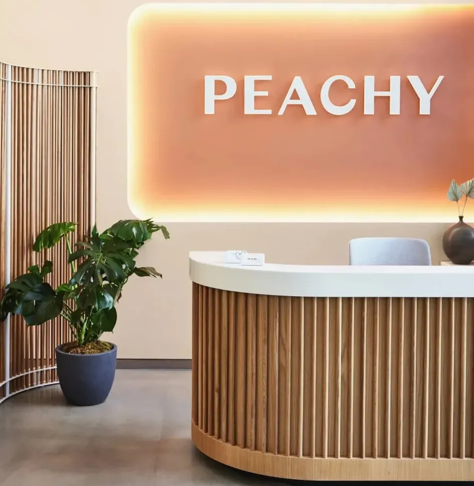 Clean, professional medical spa treatment room with neutral tones at Peachy - West Manhattan in New York