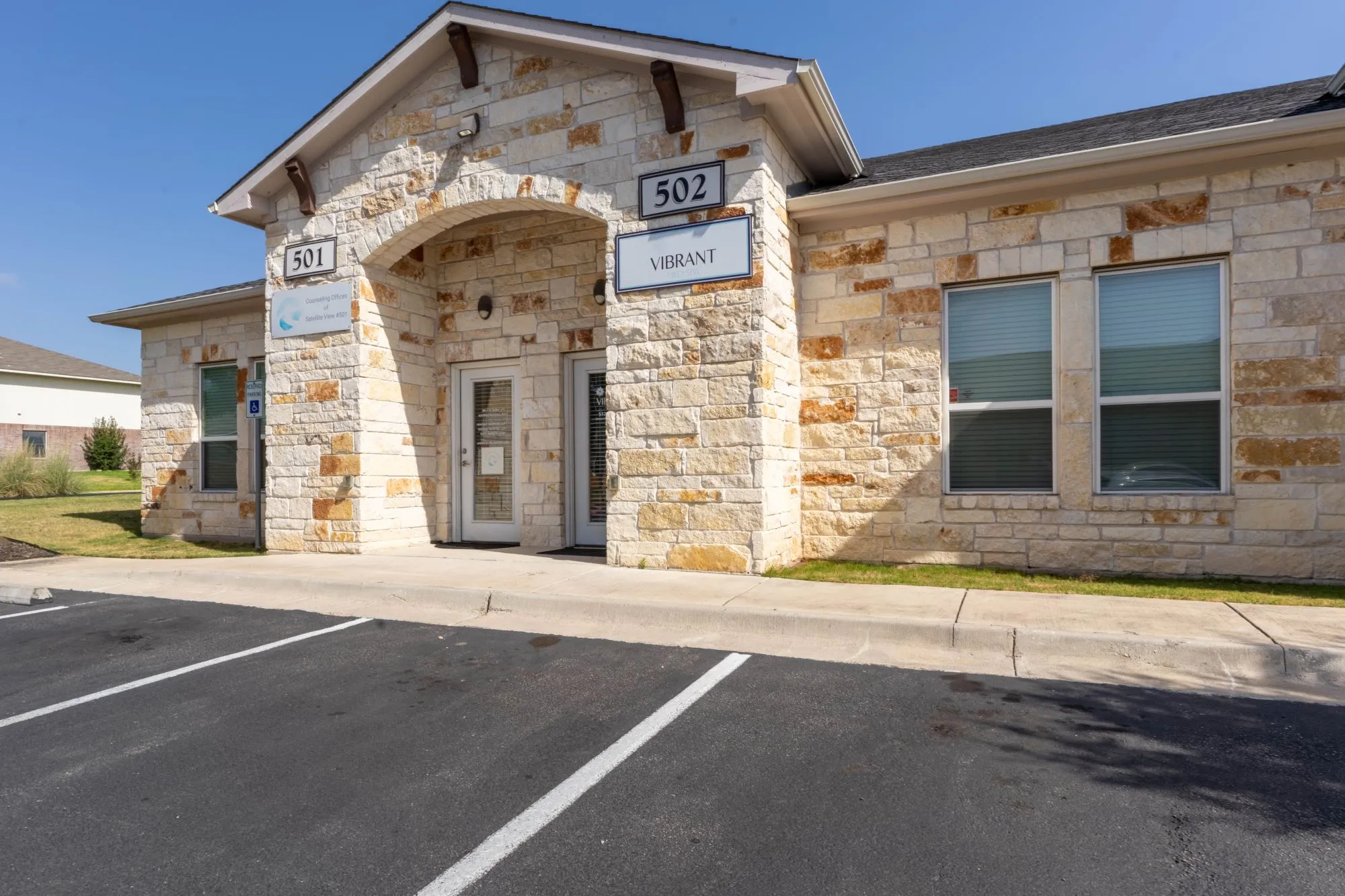 Clean, professional medical spa treatment room with neutral tones at Vibrant Med Spa in Round Rock