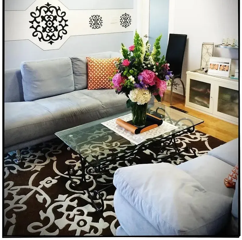 Clean, professional medical spa treatment room with neutral tones at Bel-Art Aesthetics in New Bedford