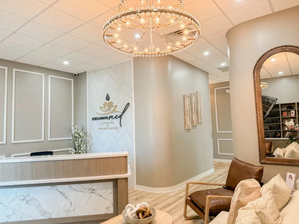 Clean, professional medical spa treatment room with neutral tones at Exclusive Med Aesthetics in Windermere