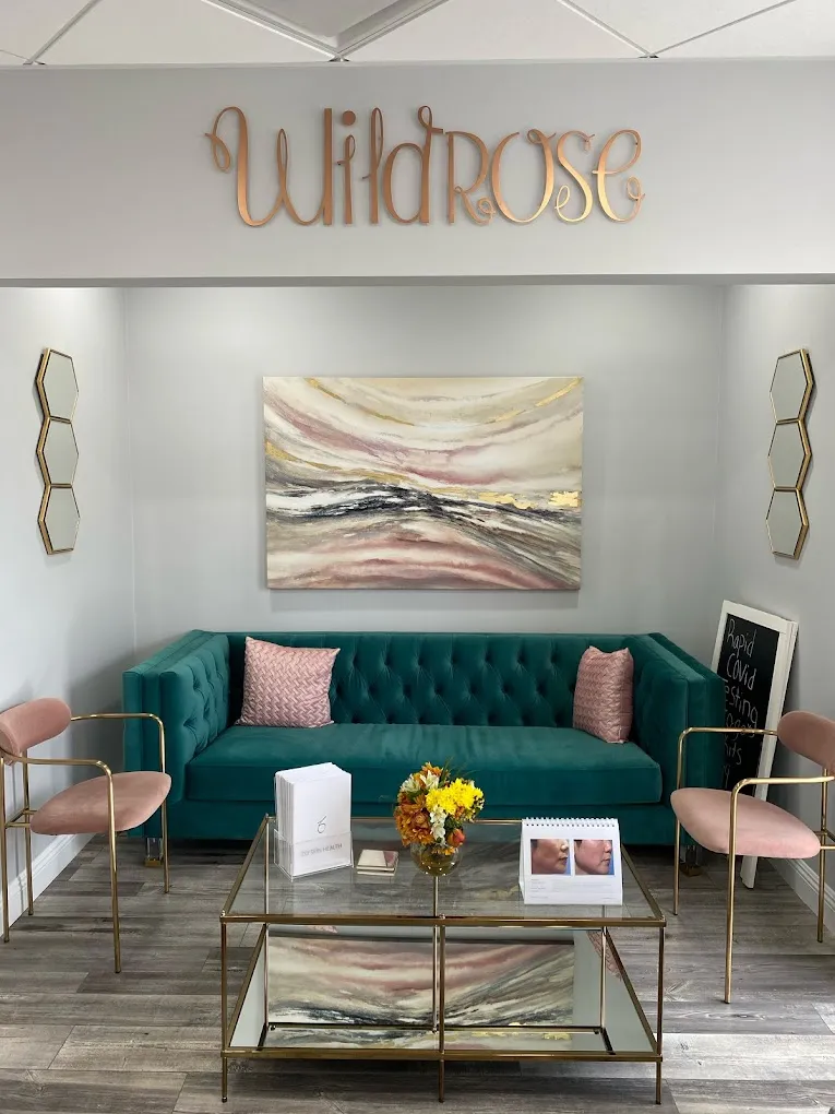 Clean, professional medical spa treatment room with neutral tones at Wildrose Aesthetics in Newport Beach