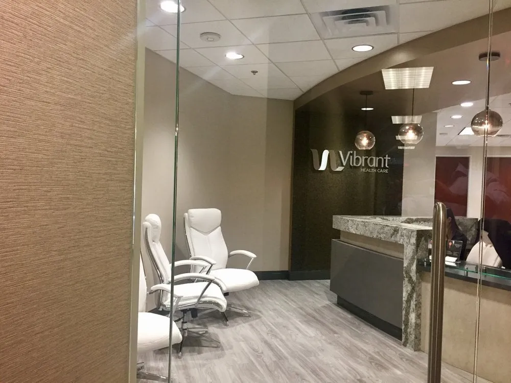Clean, professional medical spa treatment room with neutral tones at Vibrant Health Care, Inc. in Scottsdale