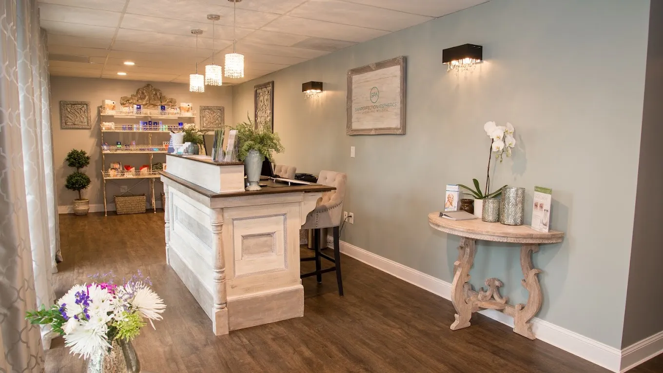 Clean, professional medical spa treatment room with neutral tones at Skin Perfection Aesthetics in Northglenn