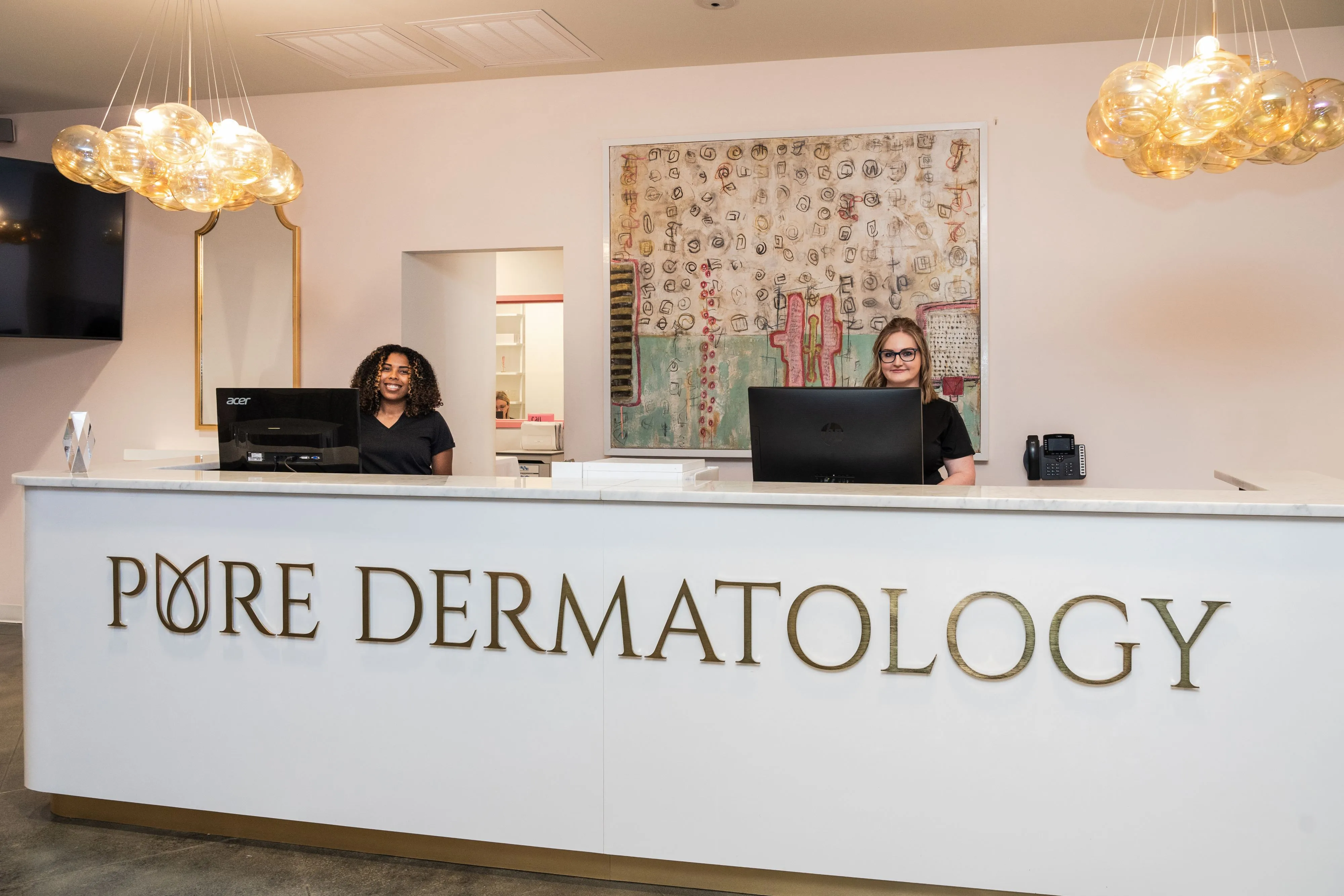 Clean, professional medical spa treatment room with neutral tones at Pure Dermatology in Metairie