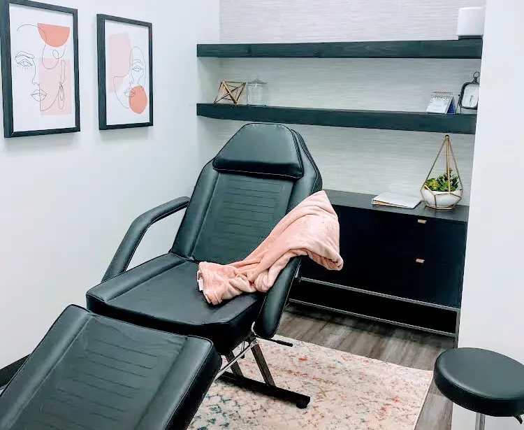 Clean, professional medical spa treatment room with neutral tones at Skyler Holt, RN Injector in Farmington