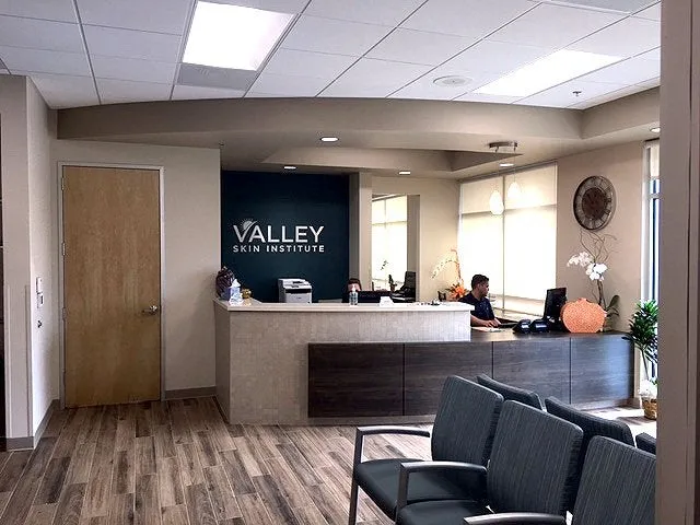 Clean, professional medical spa treatment room with neutral tones at Valley Skin Institute in Fresno
