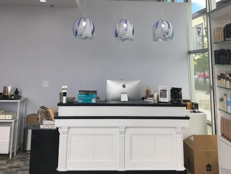 Clean, professional medical spa treatment room with neutral tones at Lucienne Salon in South Jordan