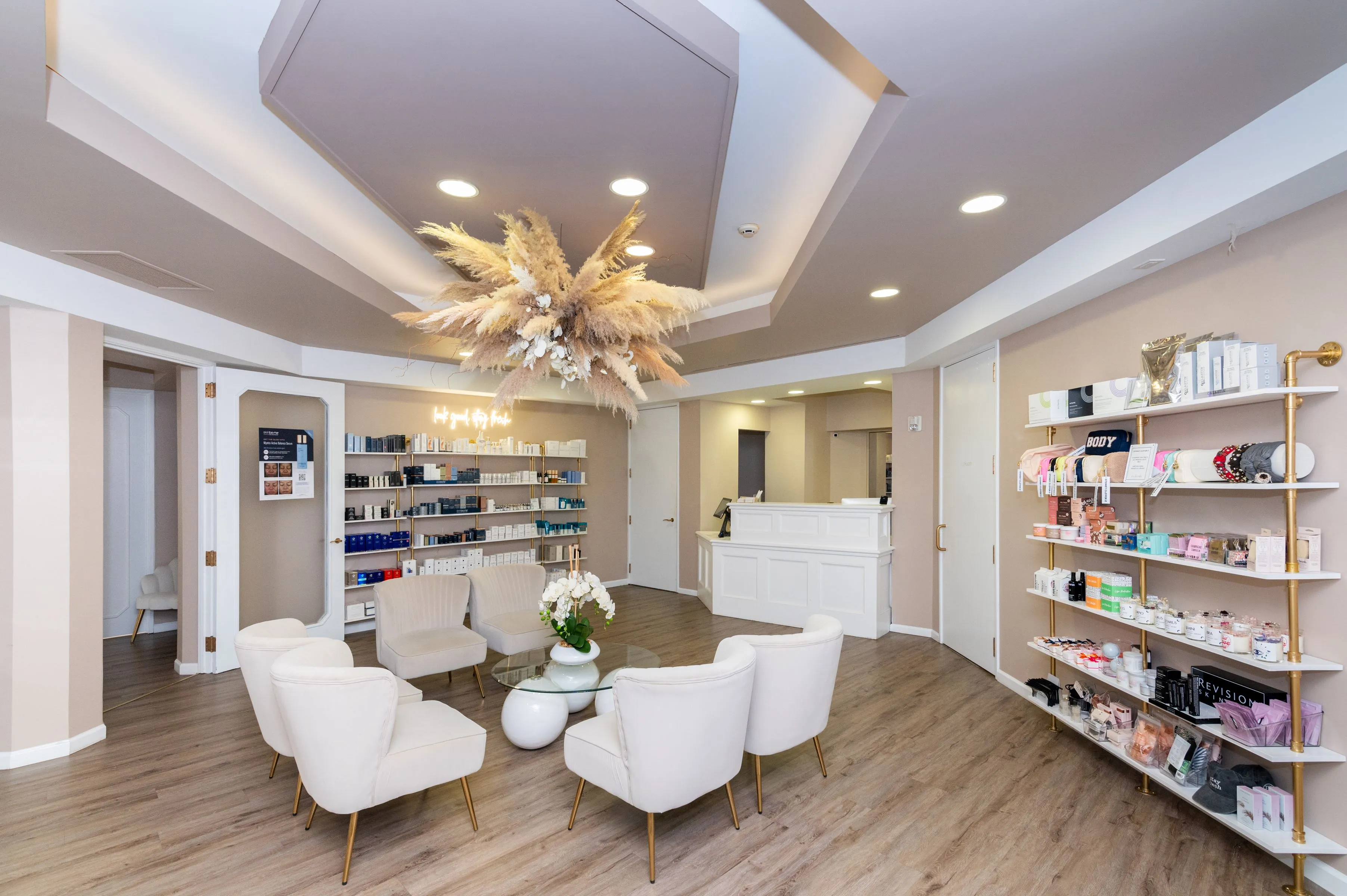 Clean, professional medical spa treatment room with neutral tones at re:fresh skin + injectables in VALHALLA