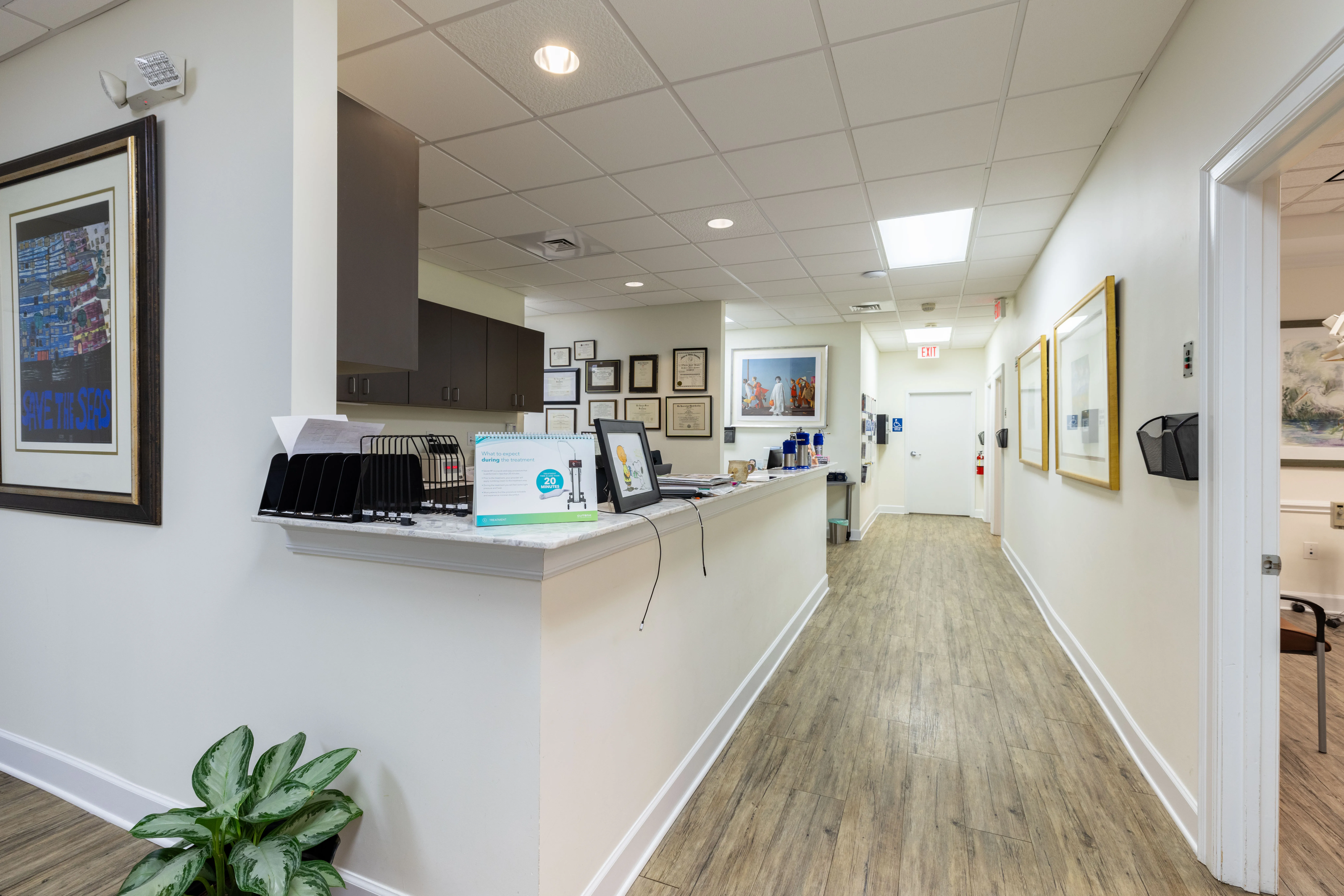 Clean, professional medical spa treatment room with neutral tones at Dilworth Dermatology in Charlotte