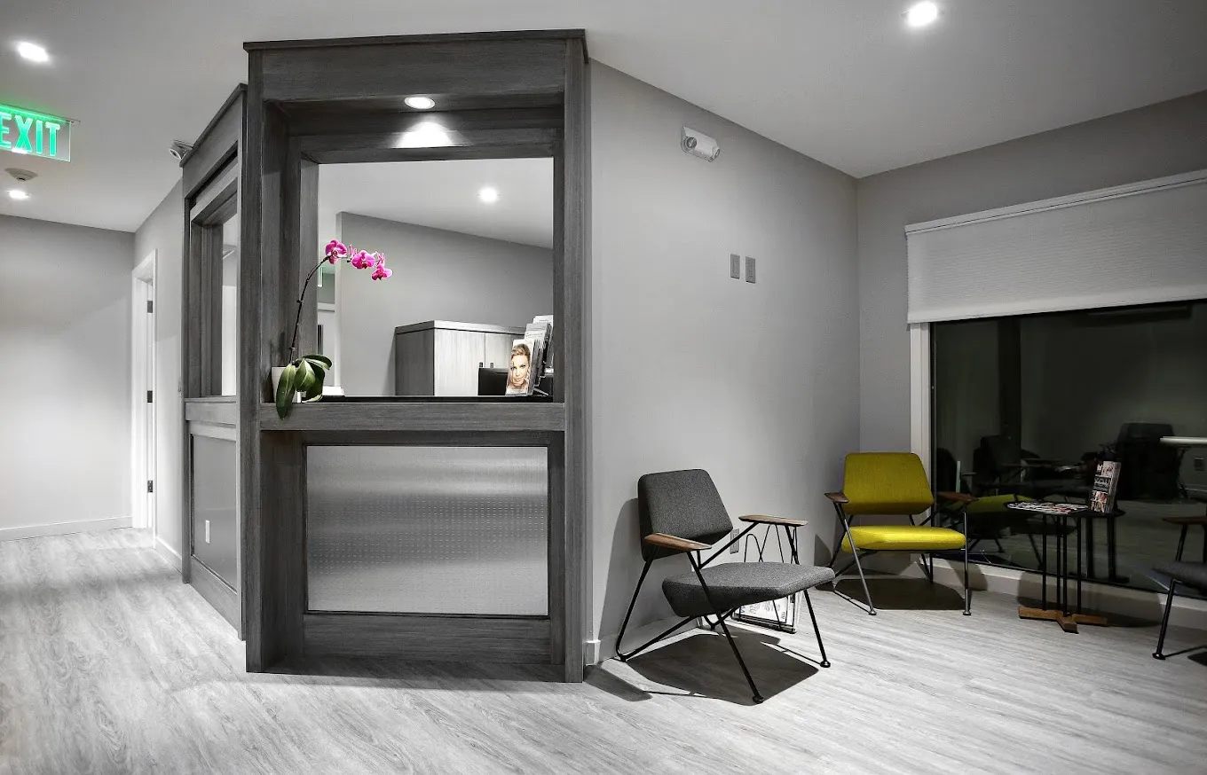 Clean, professional medical spa treatment room with neutral tones at Cesar Sierra, MD in Westport
