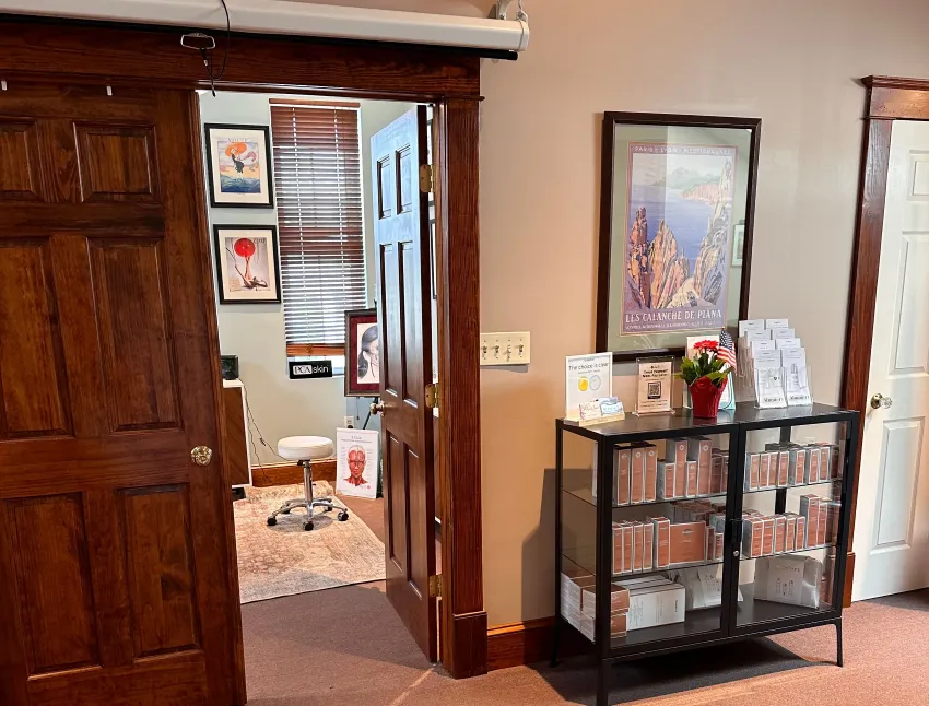 Clean, professional medical spa treatment room with neutral tones at Spirited Aesthetics + Wellness in Hampstead