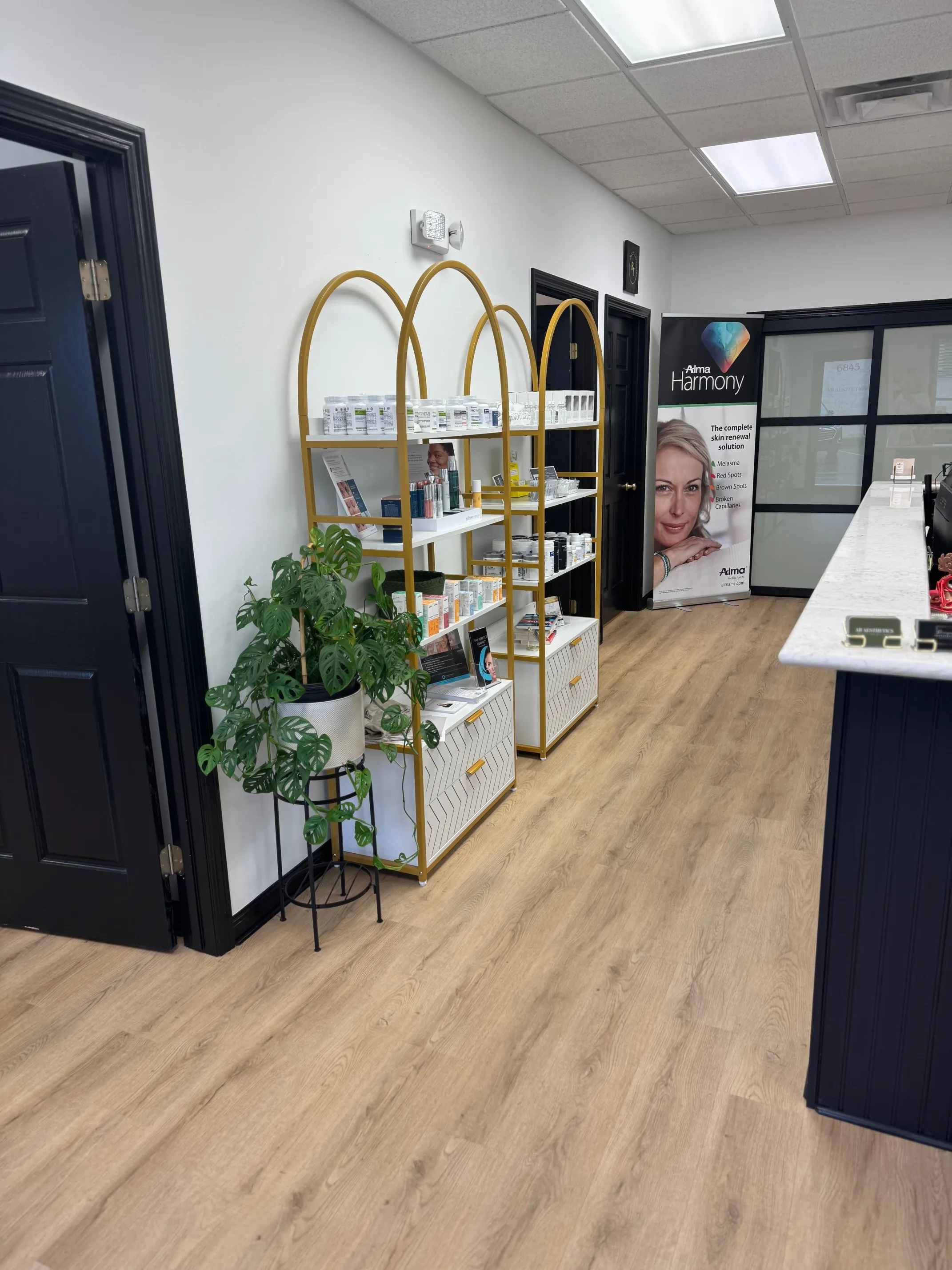 Clean, professional medical spa treatment room with neutral tones at AB Aesthetics, LLC in Whitehouse
