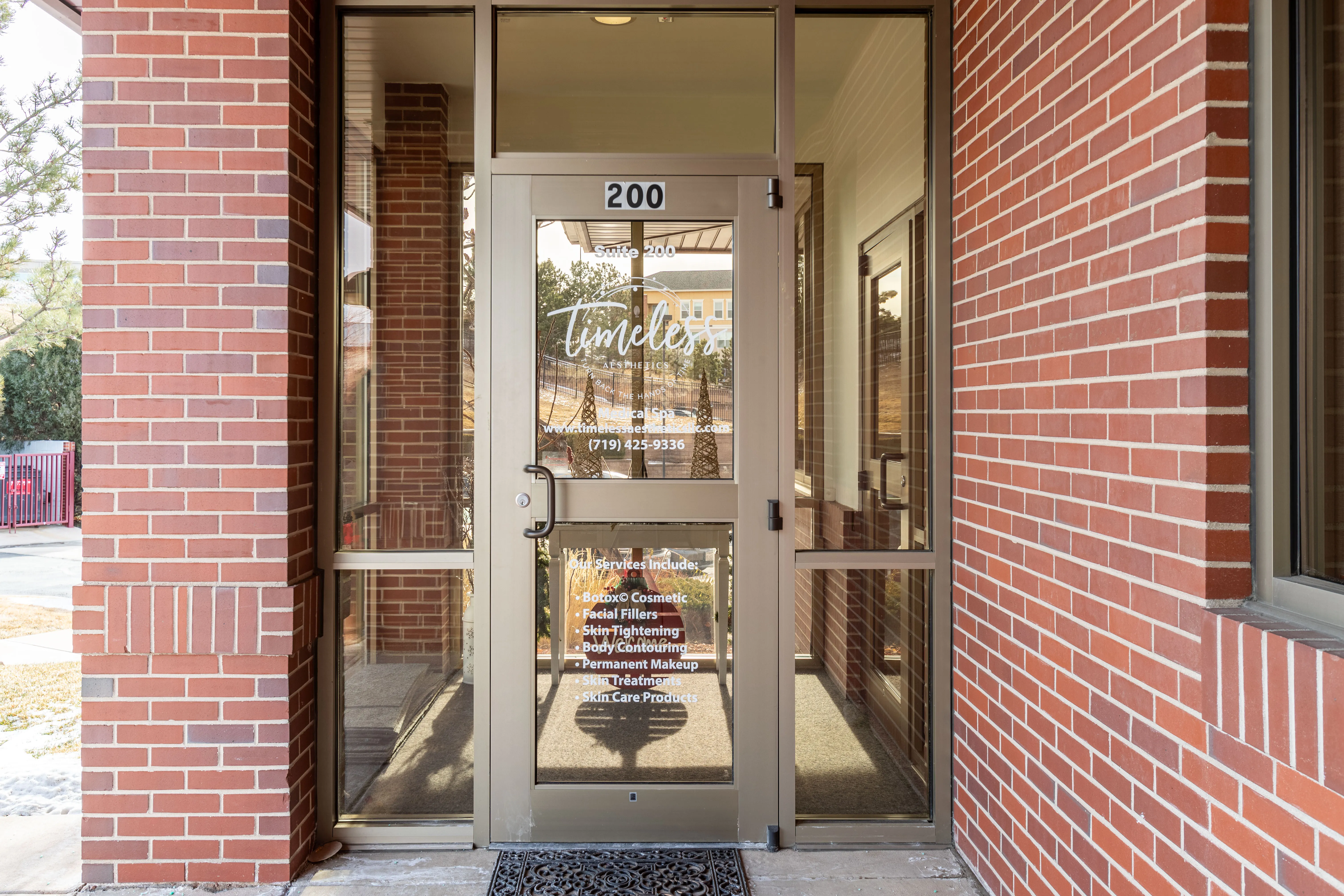 Clean, professional medical spa treatment room with neutral tones at Timeless Aesthetics in Colorado Springs