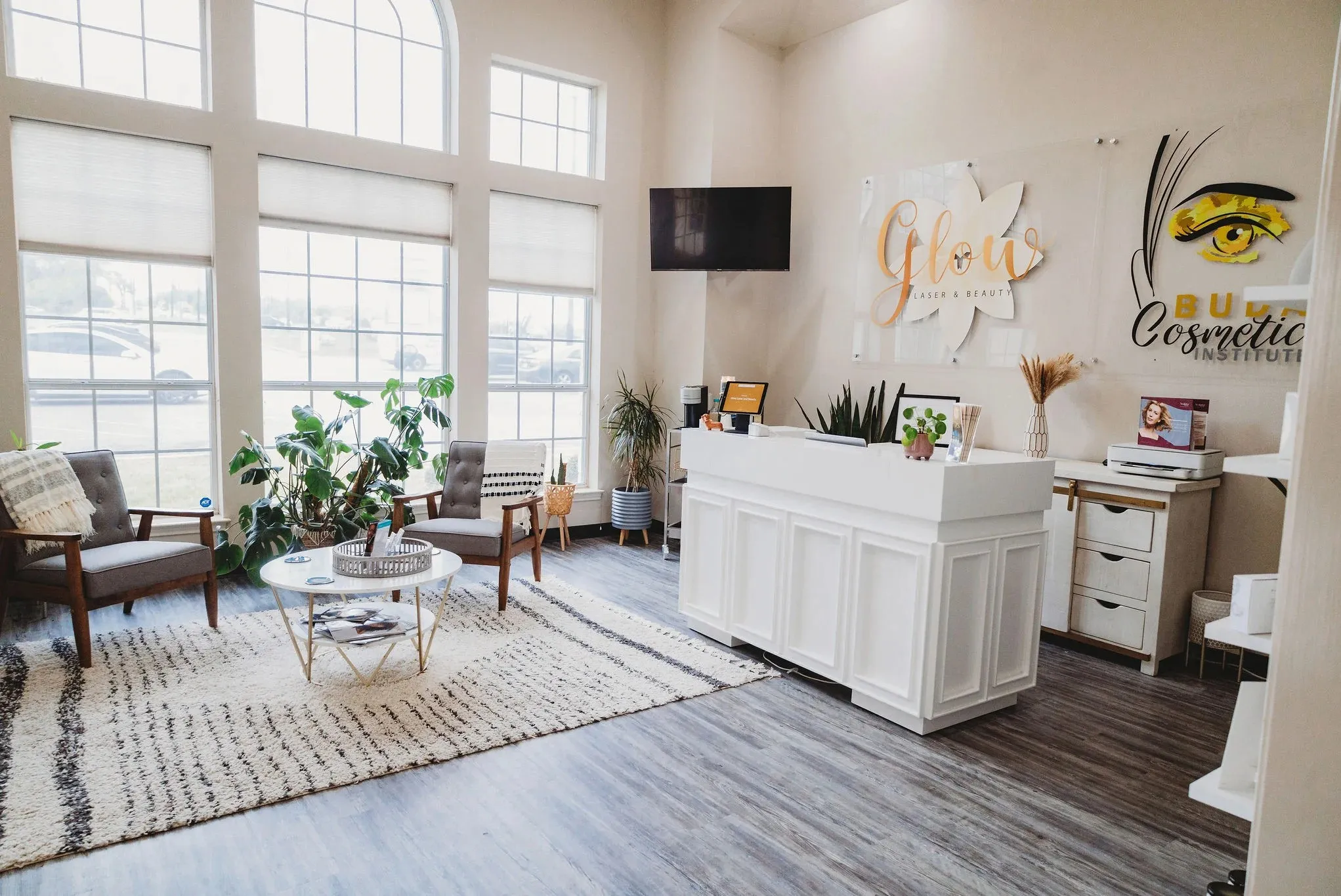 Clean, professional medical spa treatment room with neutral tones at Glow Laser & Beauty in Buda