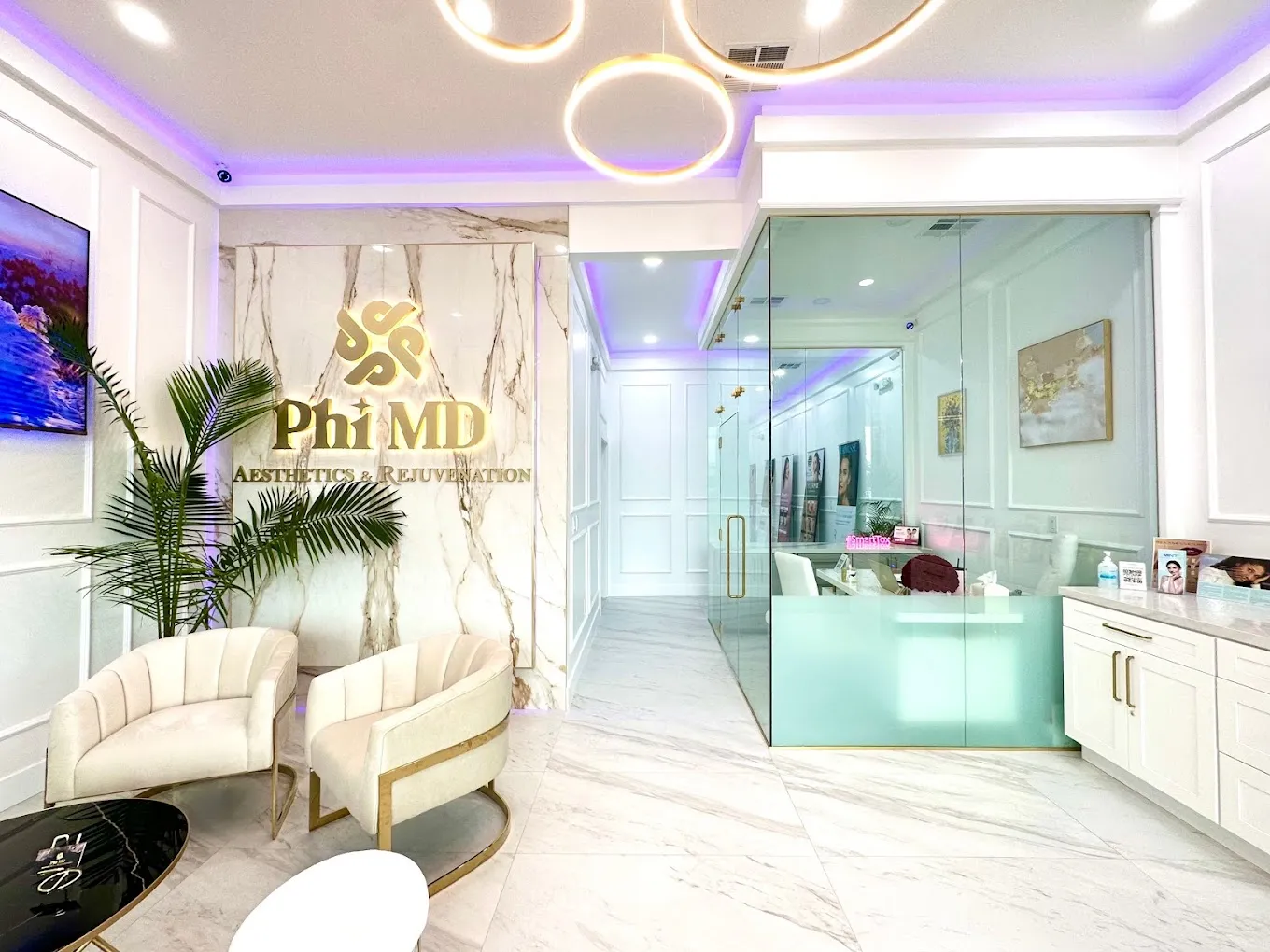 Clean, professional medical spa treatment room with neutral tones at Phi MD Aesthetics & Rejuvenation in Fountain Valley