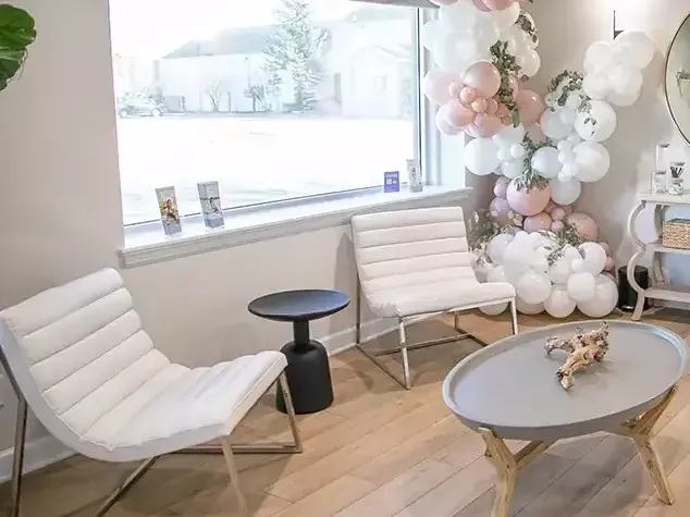 Clean, professional medical spa treatment room with neutral tones at Elite Aesthetics in Elkhart