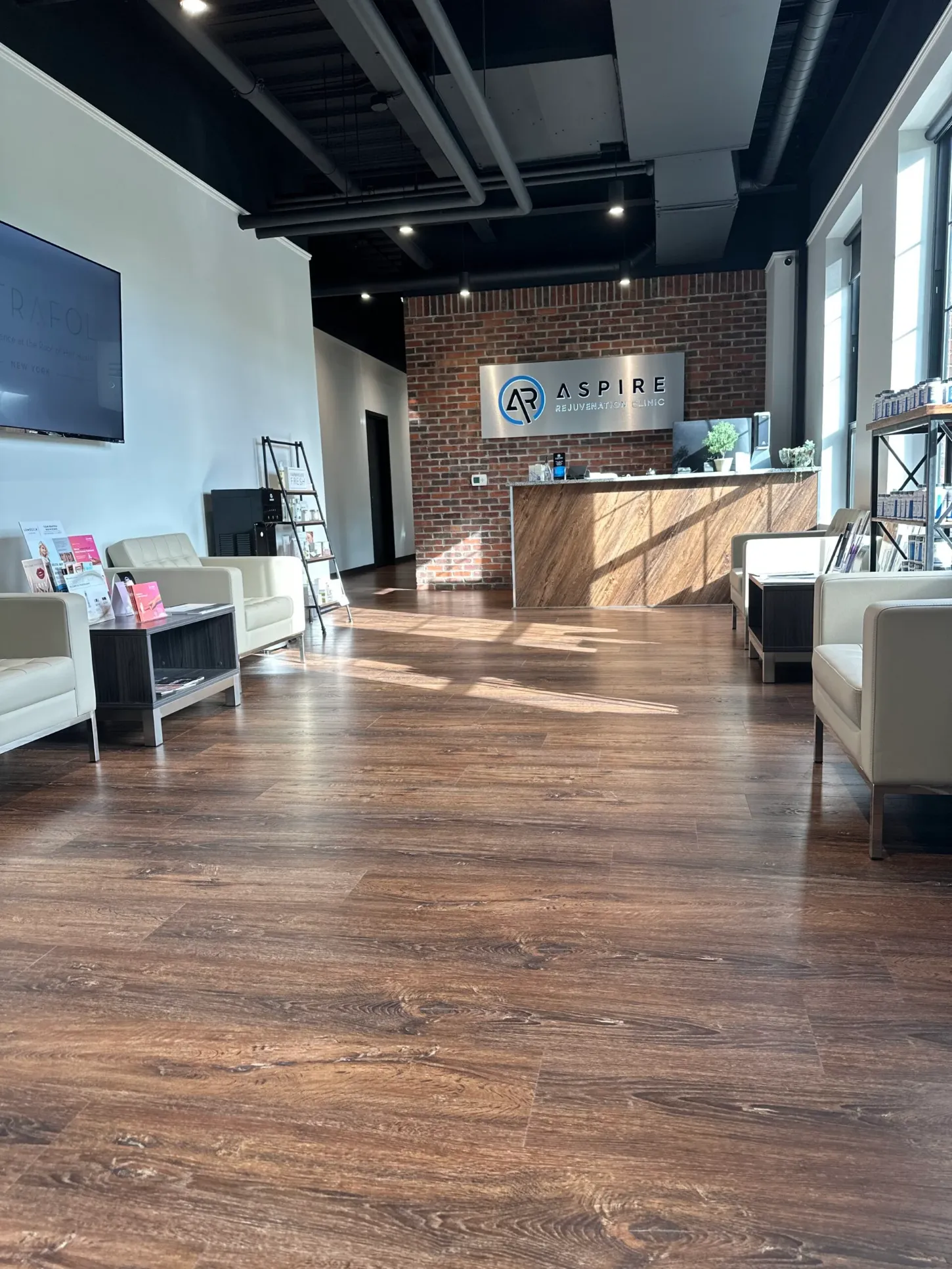 Clean, professional medical spa treatment room with neutral tones at Aspire Rejuvenation Clinics in Wexford