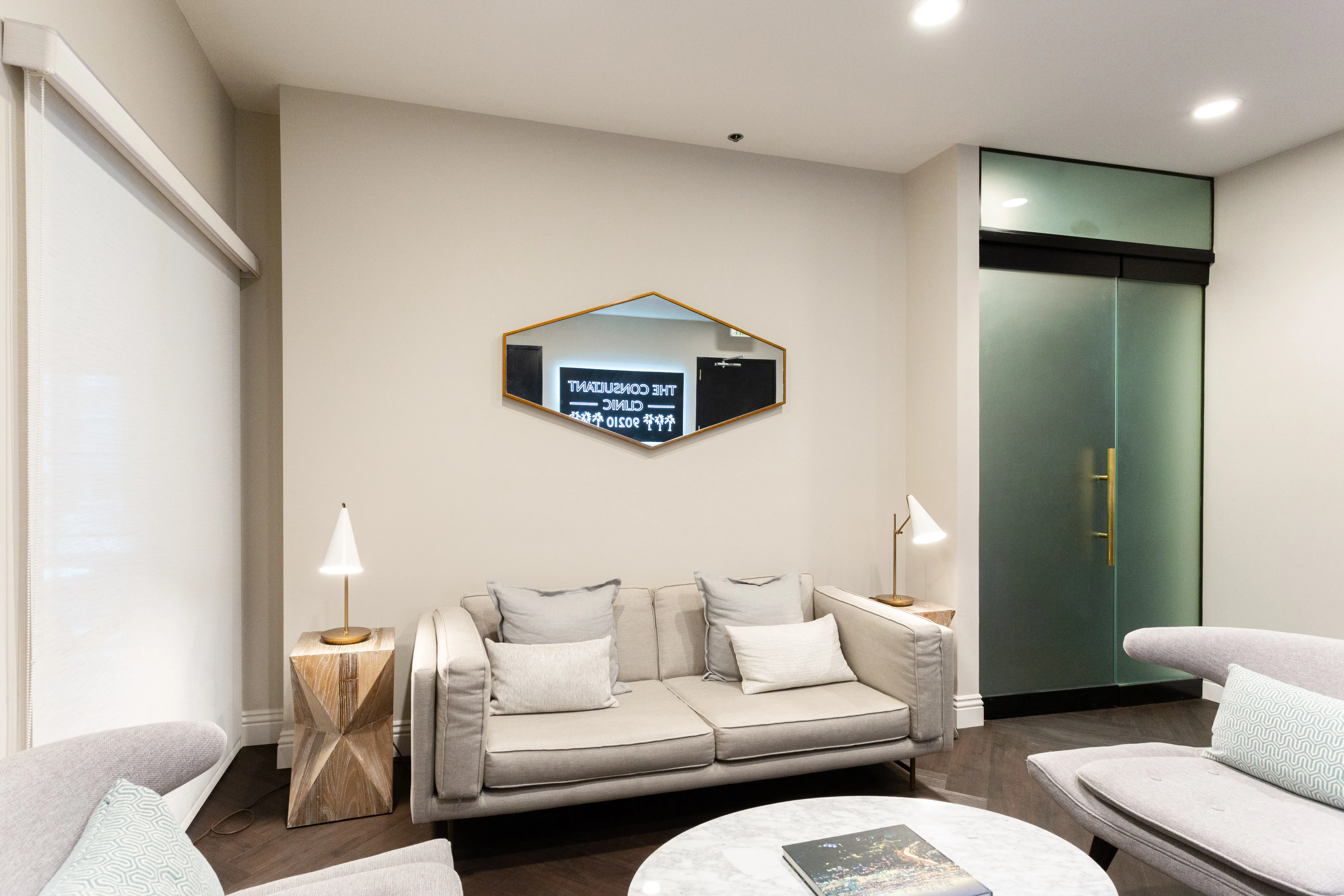 Clean, professional medical spa treatment room with neutral tones at The Consultant Clinic in Beverly Hills