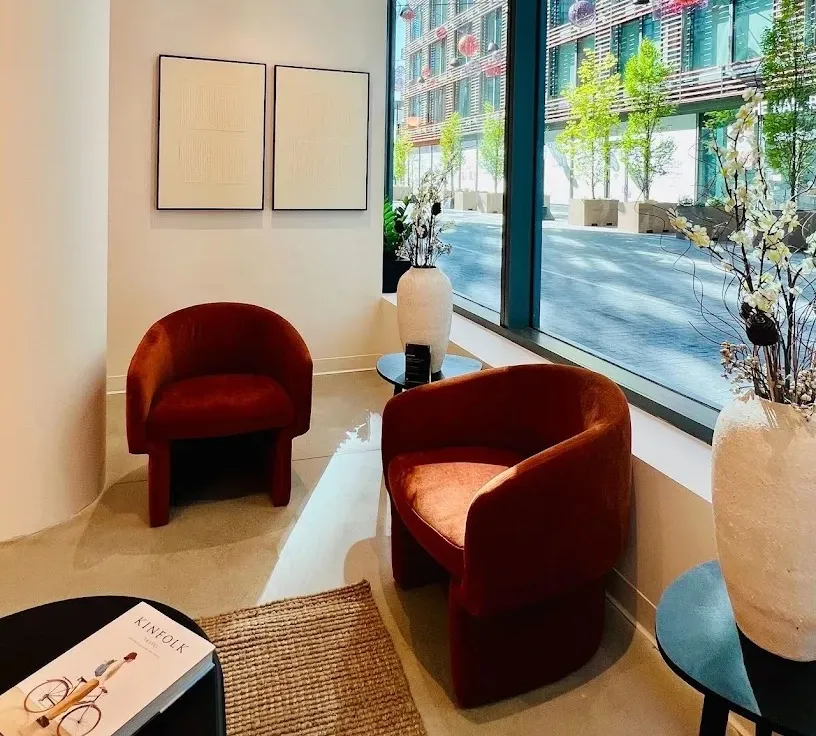 Clean, professional medical spa treatment room with neutral tones at Peachy - Shaw in Washington