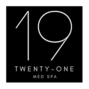 Clean, professional medical spa treatment room with neutral tones at 19 TWENTY-ONE MED SPA in Saginaw