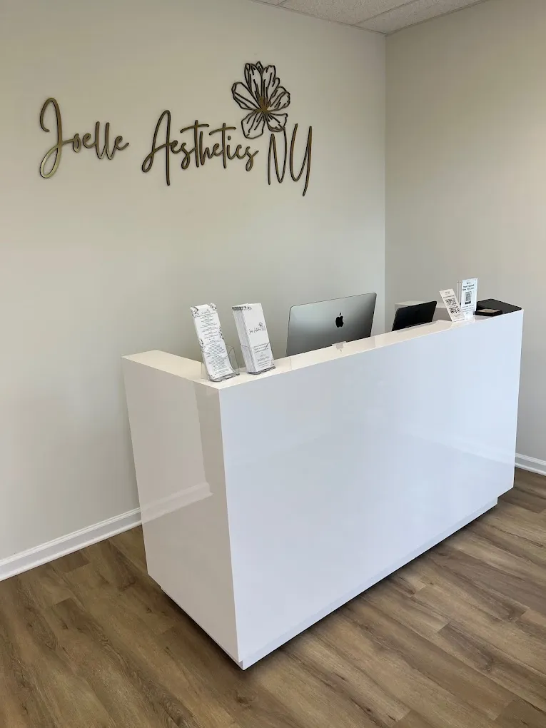 Clean, professional medical spa treatment room with neutral tones at Joelle Aesthetics in Carmel Hamlet