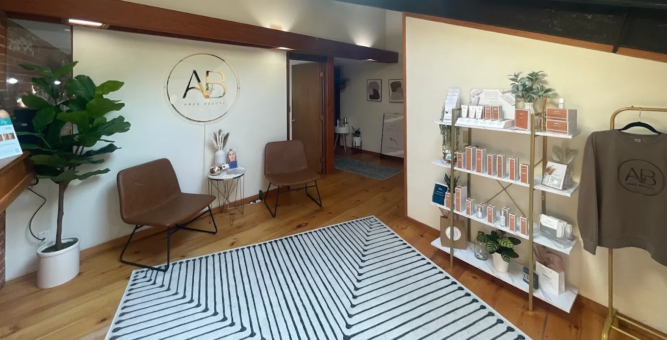 Clean, professional medical spa treatment room with neutral tones at Aneu Beauty in Stillwater