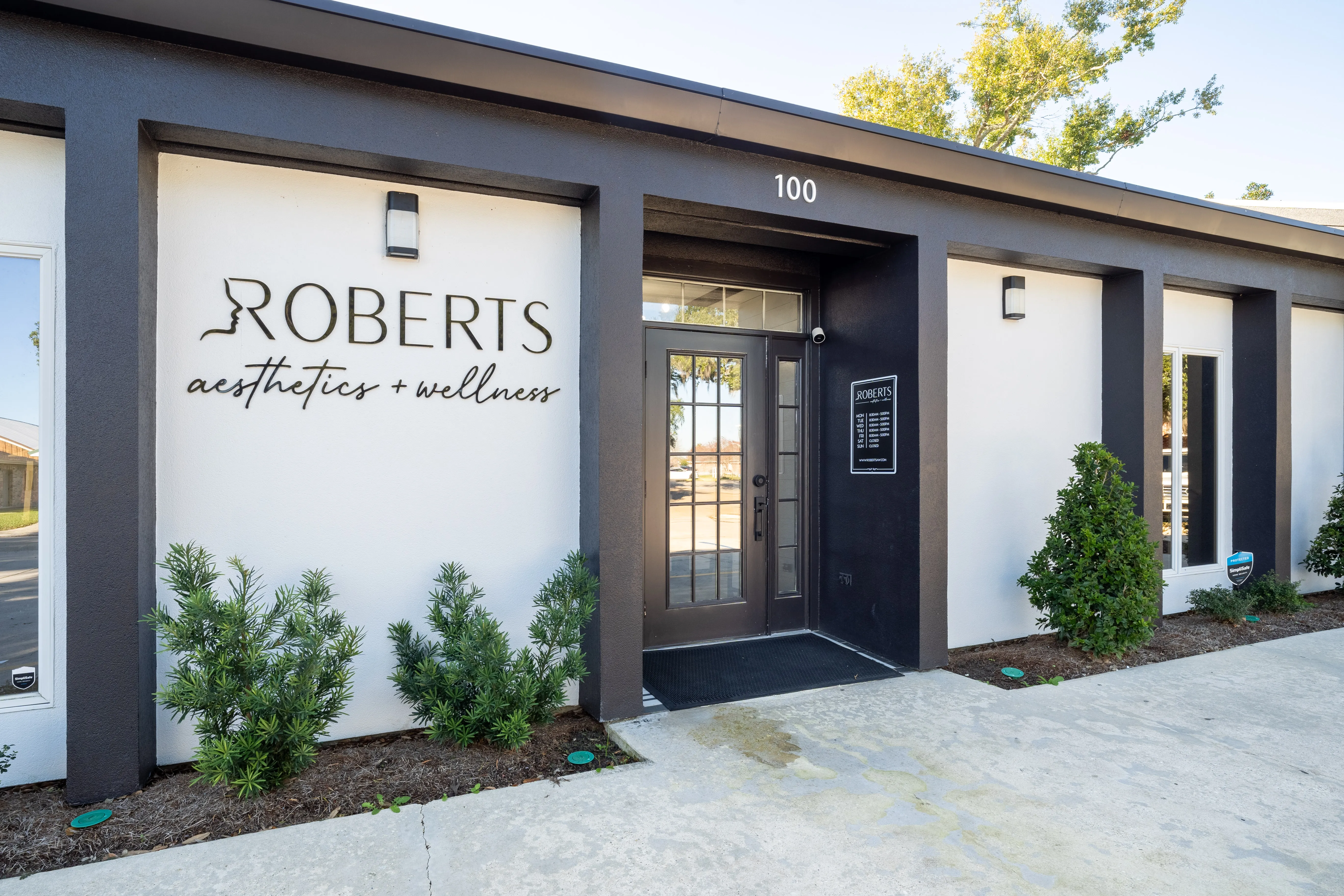 Clean, professional medical spa treatment room with neutral tones at Roberts Aesthetics and Wellness in Houma