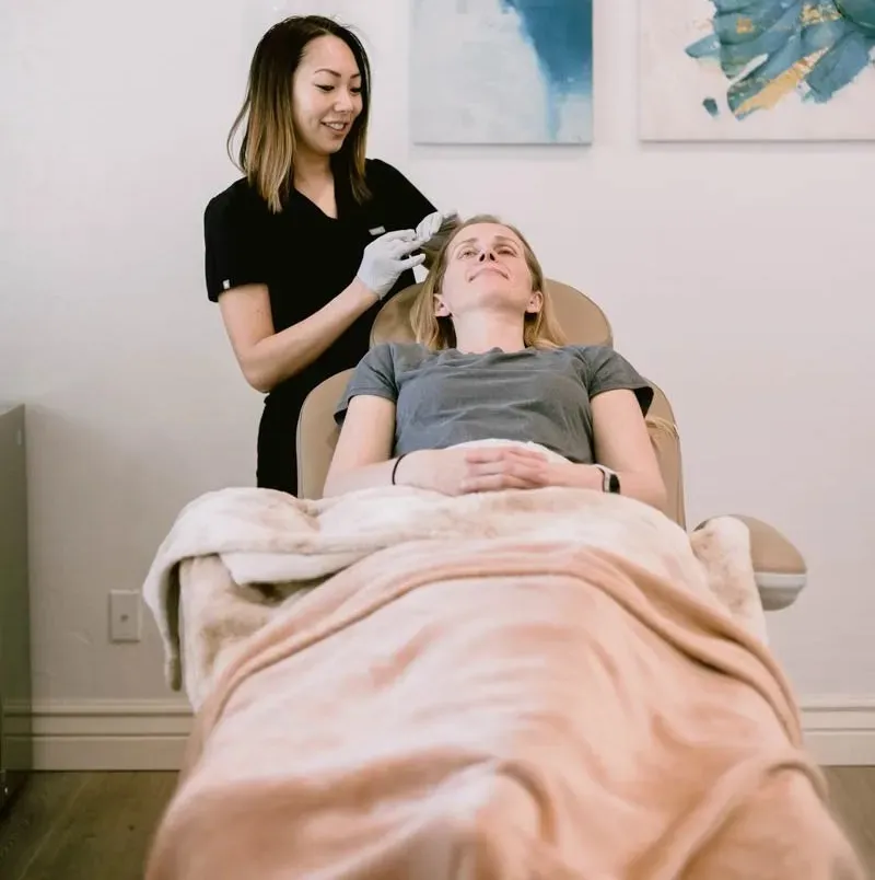 Clean, professional medical spa treatment room with neutral tones at Peak Concierge Medicine in Midway