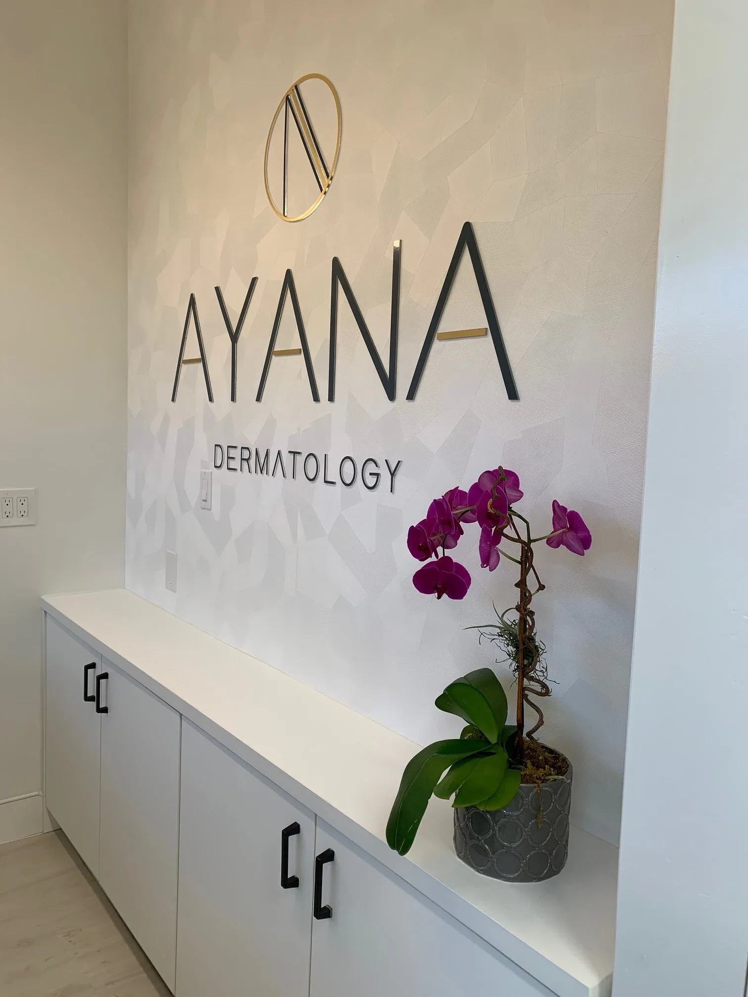 Clean, professional medical spa treatment room with neutral tones at AYANA Dermatology in Fort Lauderdale