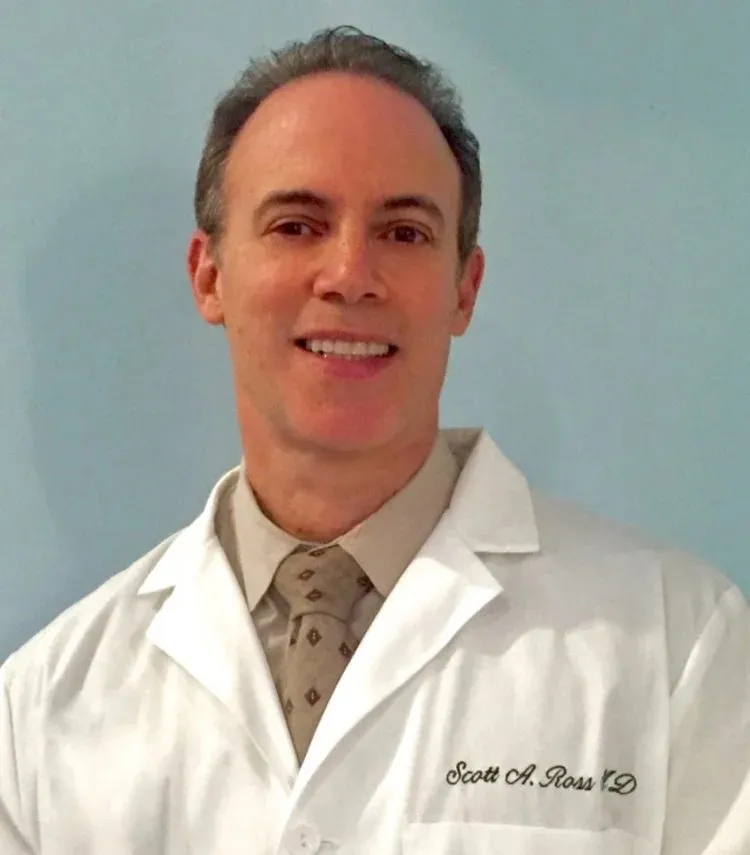 Clean, professional medical spa treatment room with neutral tones at Naples Dermatology in Naples
