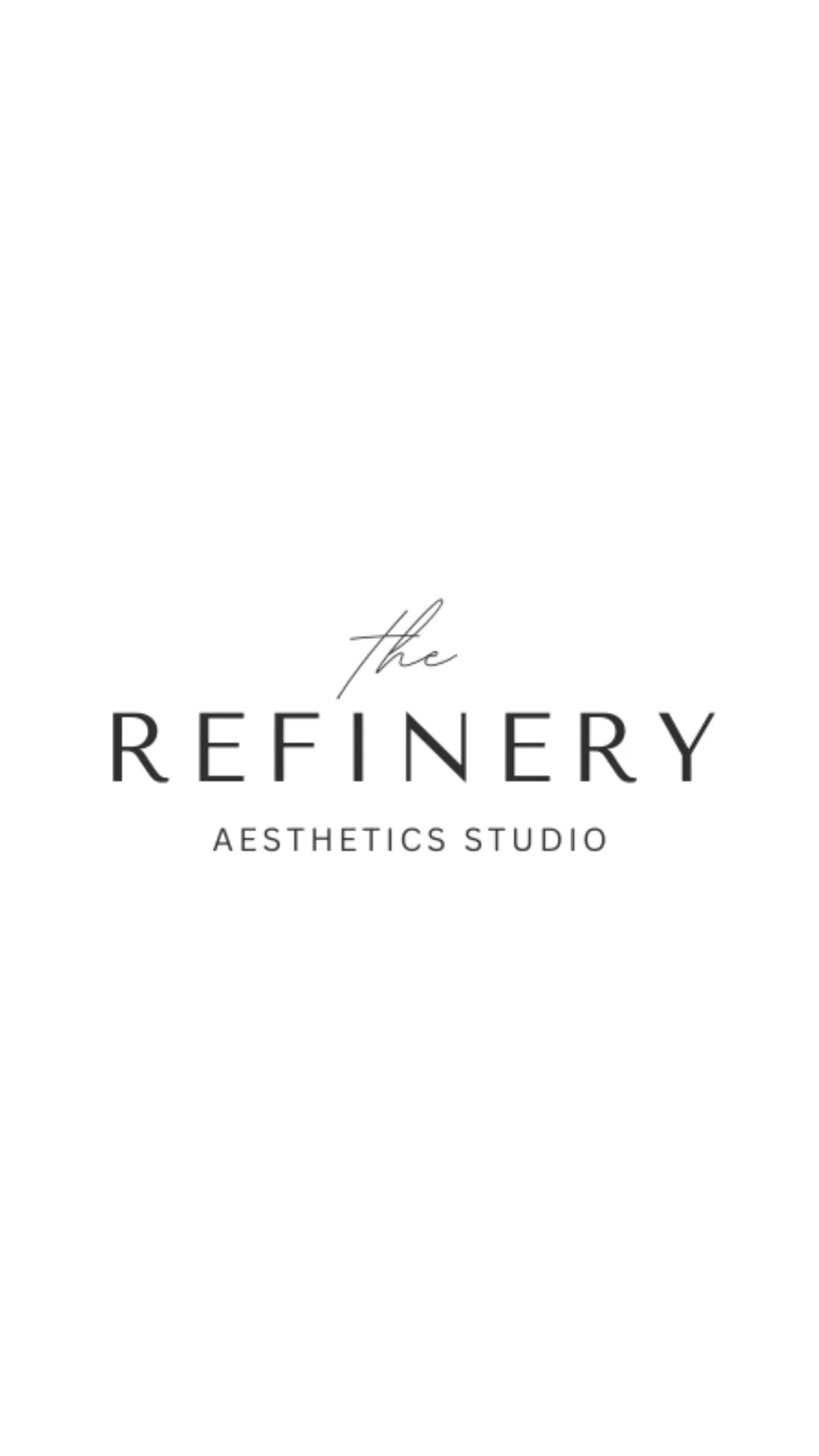 Clean, professional medical spa treatment room with neutral tones at The Refinery in Caledonia
