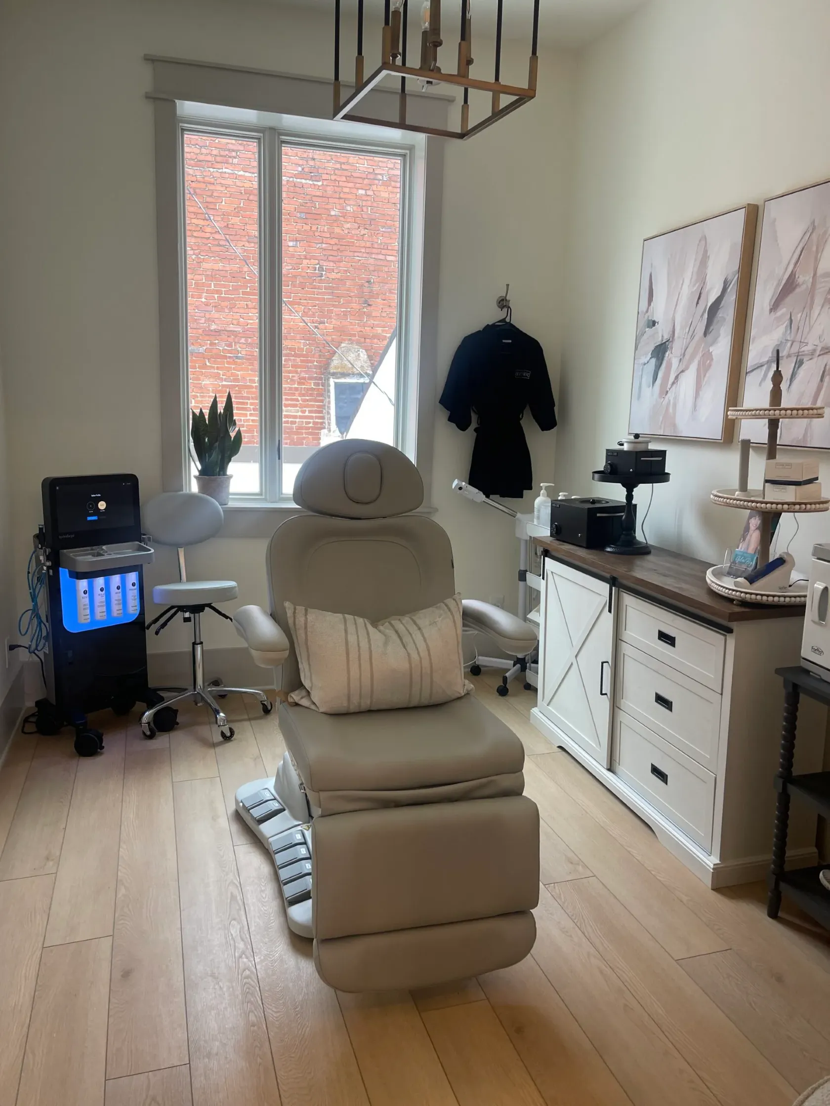 Clean, professional medical spa treatment room with neutral tones at The Refinery in Lebanon
