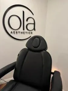 Clean, professional medical spa treatment room with neutral tones at Ola Aesthetics in Los Angeles
