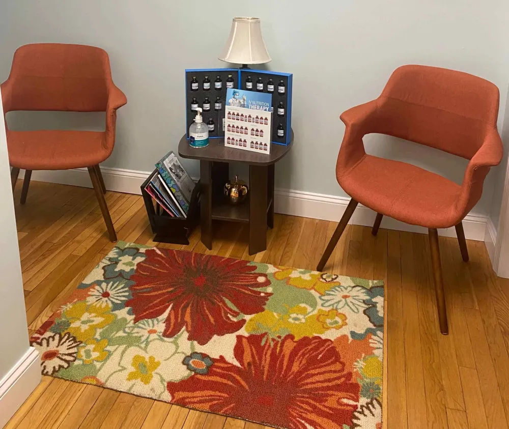 Clean, professional medical spa treatment room with neutral tones at Integrative Medicine of New England in Dedham