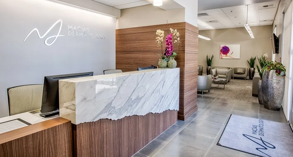 Clean, professional medical spa treatment room with neutral tones at Macias Dermatology in Fresno