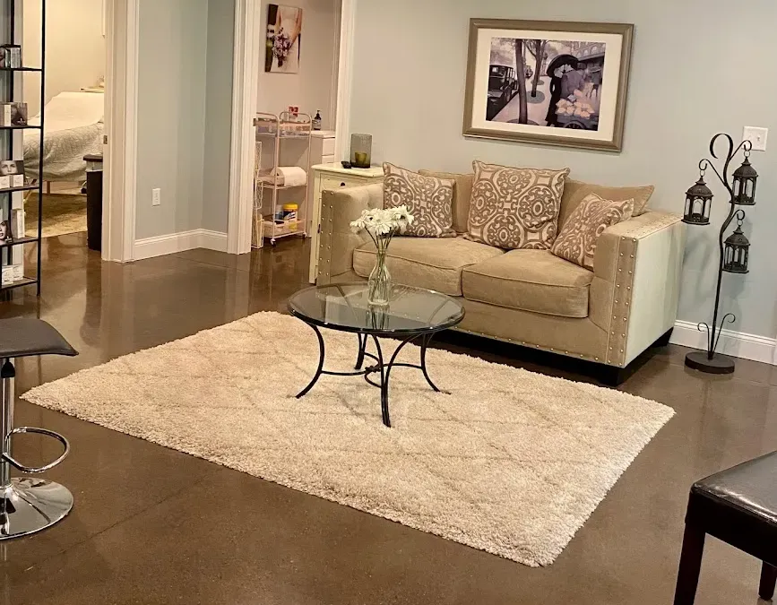 Clean, professional medical spa treatment room with neutral tones at Karma Advanced Skincare in Wrentham
