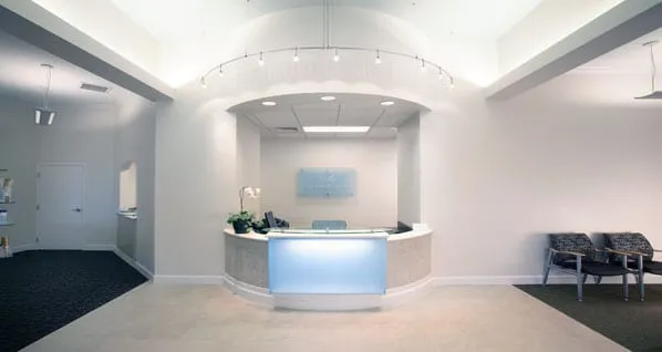 Clean, professional medical spa treatment room with neutral tones at Haley Dermatology in Fairhope