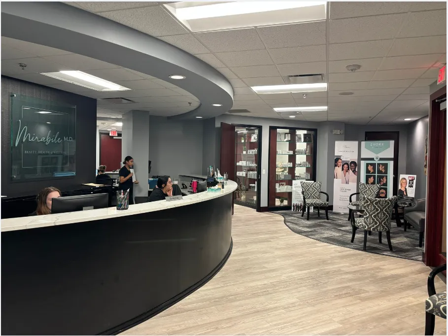 Clean, professional medical spa treatment room with neutral tones at Mirabile MD Beauty, Health & Wellness in Overland Park