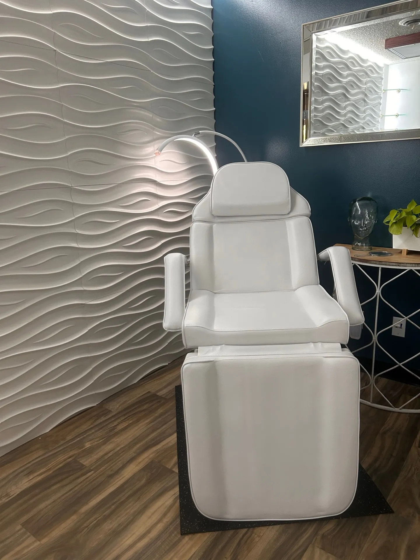 Clean, professional medical spa treatment room with neutral tones at Advanced Family Healthcare in Hastings