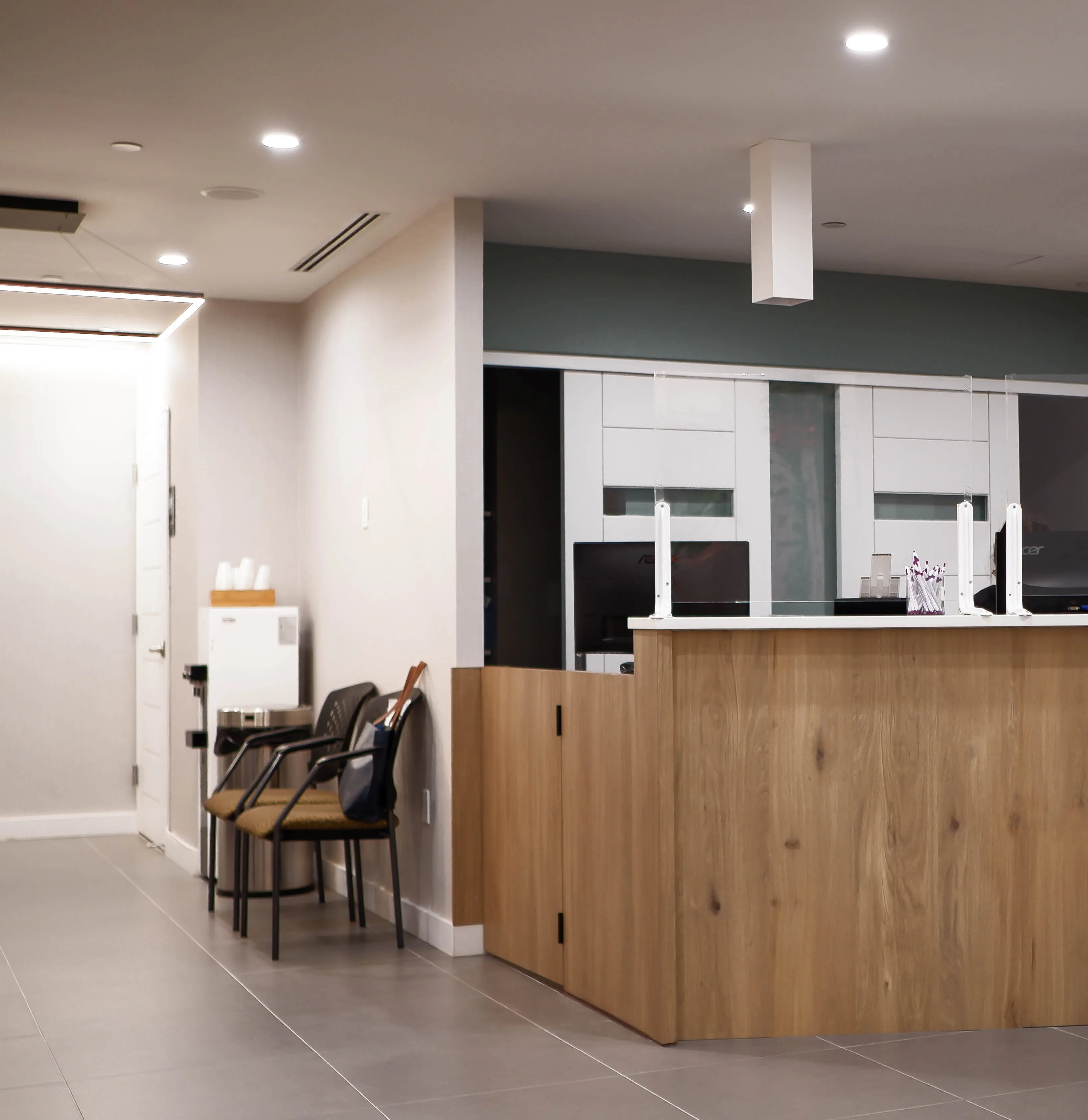 Clean, professional medical spa treatment room with neutral tones at Metro Dermatology - Flushing in Flushing